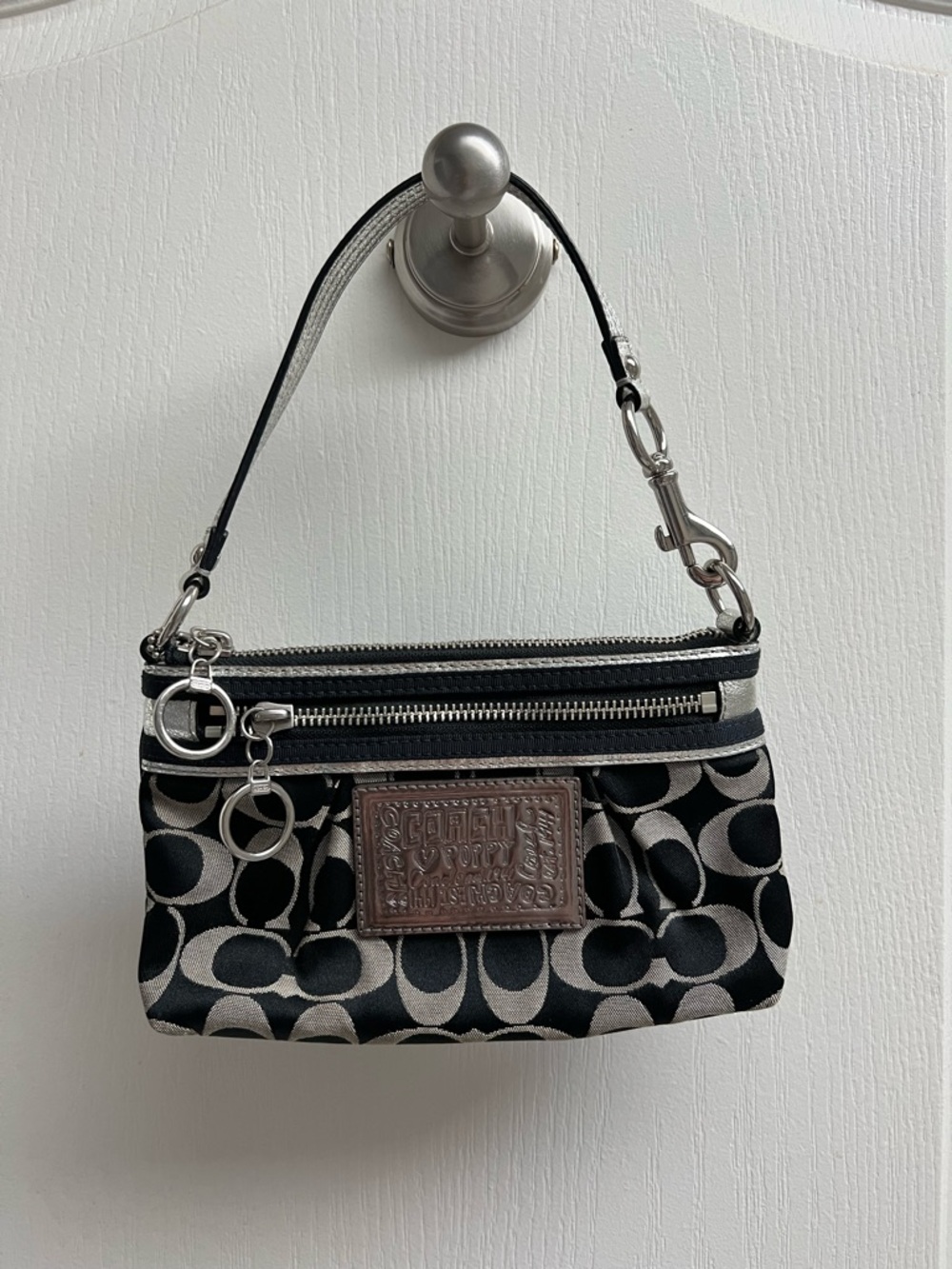 Black and White Coach Wristlet